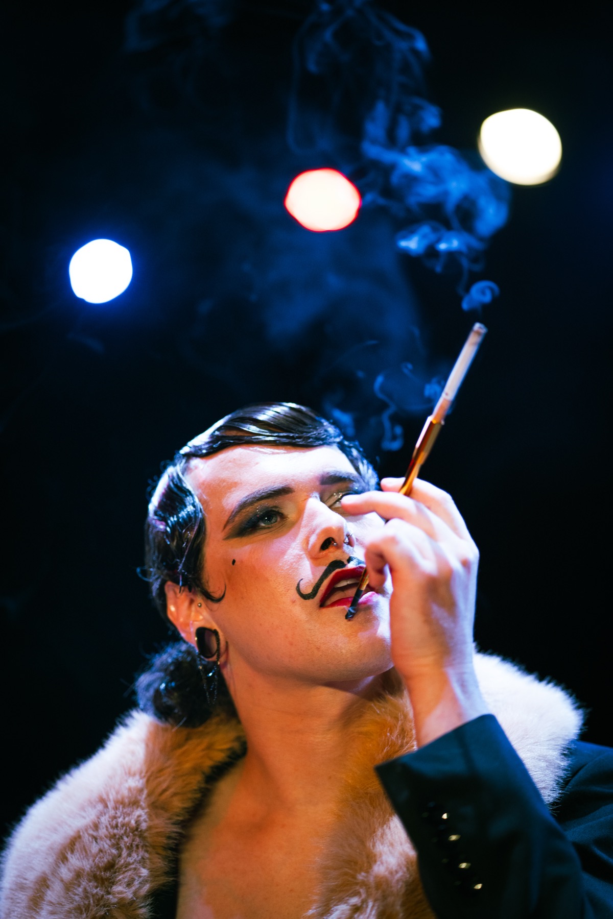 Cabaret performer with smoke